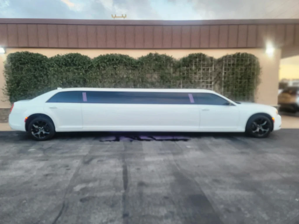 White stretch limousine, side profile
